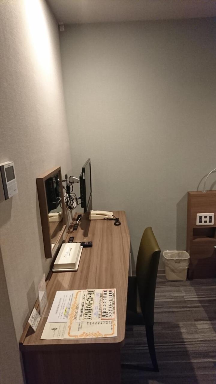 Hotel Itami Bagian luar foto